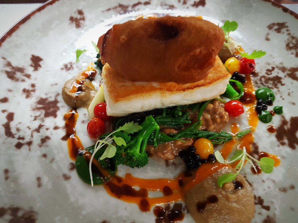 Highbullen's tweet photo. Pan-fried turbot served with black garlic risotto, red and yellow cherry tomatoes and sea vegetables.

#devonfood #DevonFoodHour #AARosette #foodwithaview #finedining #Highbullen #Highbullenhotel #Devon #Devonfinedining #turbot #feedfeed #buzzfood https://t.co/7wrAZiuIru