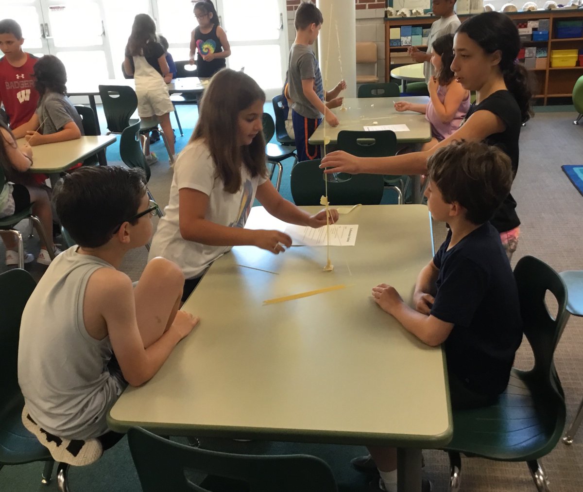 Mrs_Storz's tweet photo. Our 4th grade engineers were tasked with designing and building a structure out of a marshmallow, spaghetti, and masking tape. The tallest structure was 14.5"! #hesmakerspace https://t.co/GAgVa86GAK