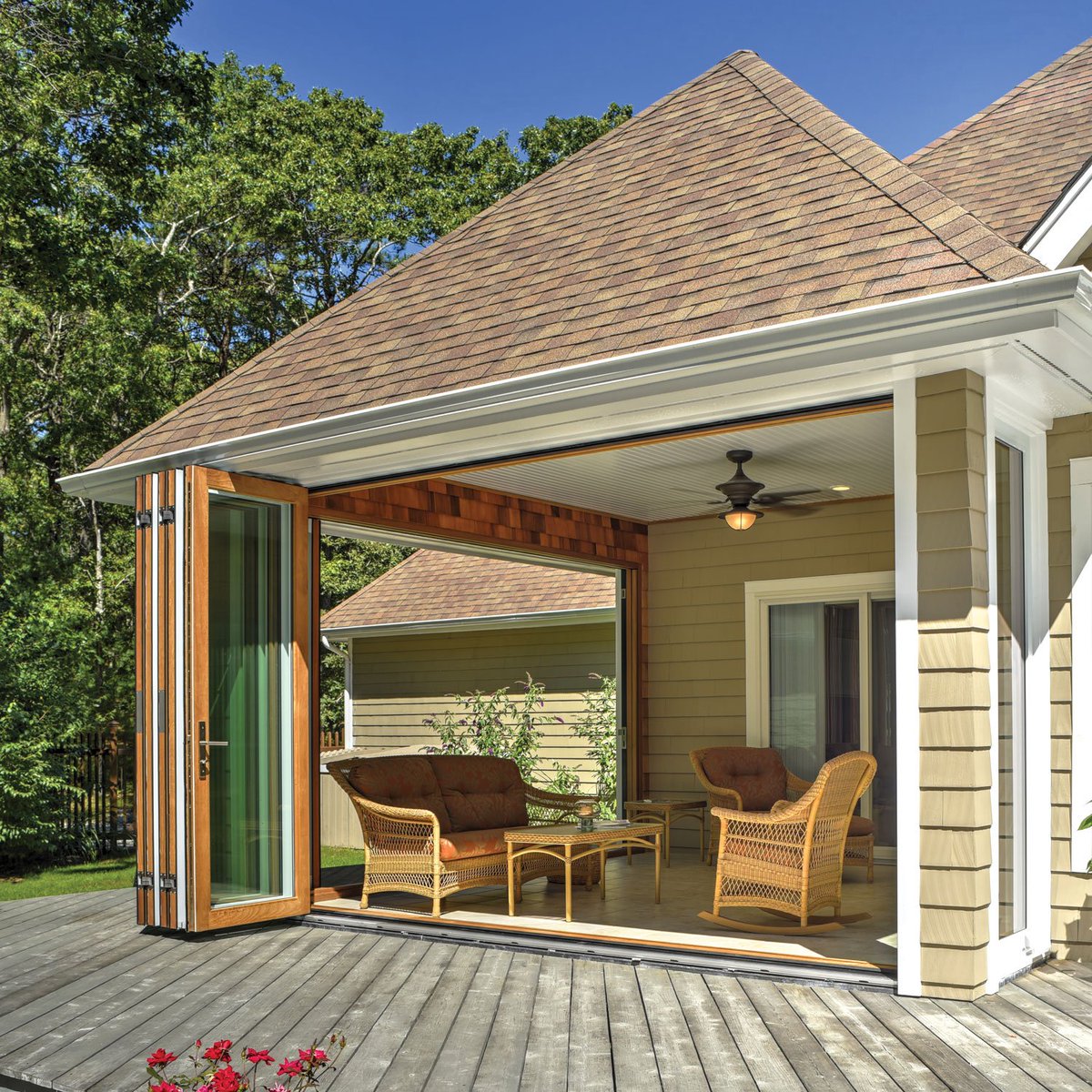 Summer is just around the corner! ☀️  Who has their home ready for the sunny days ahead? 205 Integrated Folding Doors has this Hamptons home ready for open living.