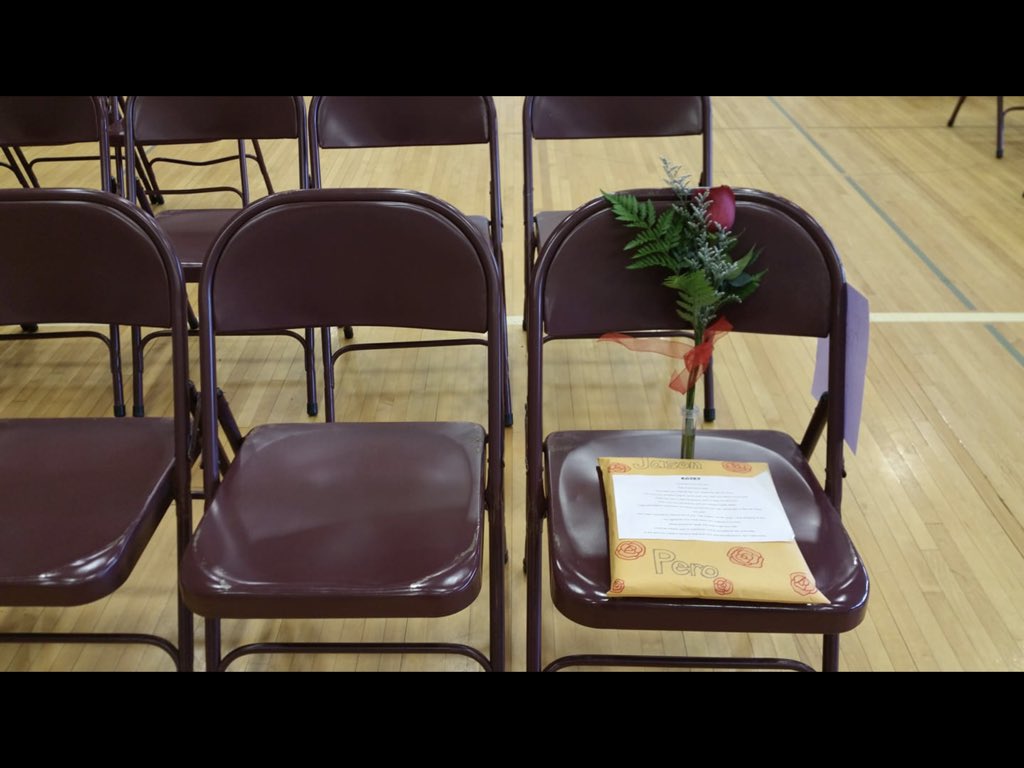 timothyanne's tweet photo. Jason Pero's chair at the Ashland 8th grade promotion ceremony. 

#JasonPero #JasonIkePero #JusticeForJasonPero

(photo shared with permission) https://t.co/UmrVznXFuy