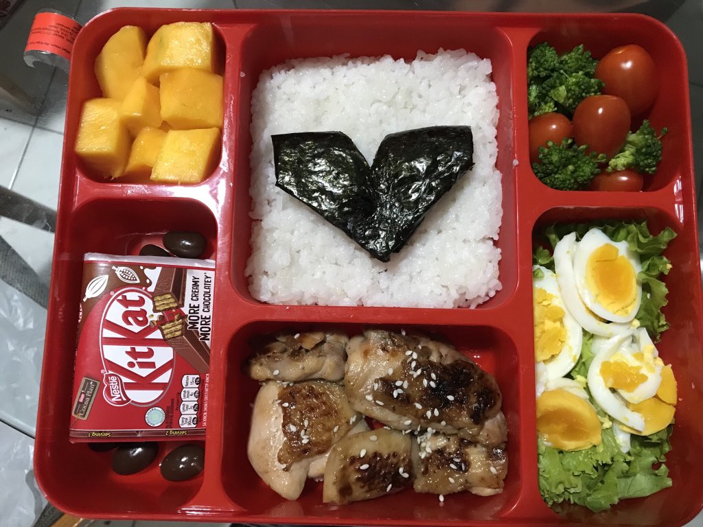 helloelvia's tweet photo. Visited @bagasmarsudi at his workplace yesterday, to bring him the bento he'd requested me to make the days before. 😄
.
*yes I sneaked a little something under the 1st layer of rice🤭❤️
#homemadebento https://t.co/kGXRhfHpWX