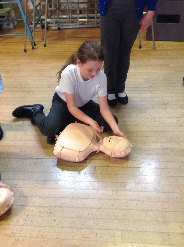 LaticsCommunity's tweet photo. 💙 Children in Year 5 at @stmariessch being educated about CPR as part of our Healthy Hearts project. 

🌟 The programme sees us deliver life saving activities to primary school pupils across the Wigan Borough. 

#wafc https://t.co/LBKzDIIbGk