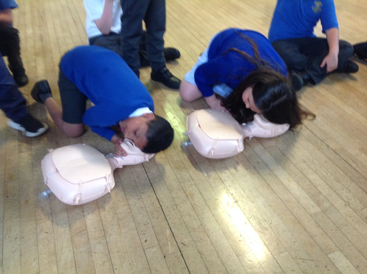 LaticsCommunity's tweet photo. 💙 Children in Year 5 at @stmariessch being educated about CPR as part of our Healthy Hearts project. 

🌟 The programme sees us deliver life saving activities to primary school pupils across the Wigan Borough. 

#wafc https://t.co/LBKzDIIbGk