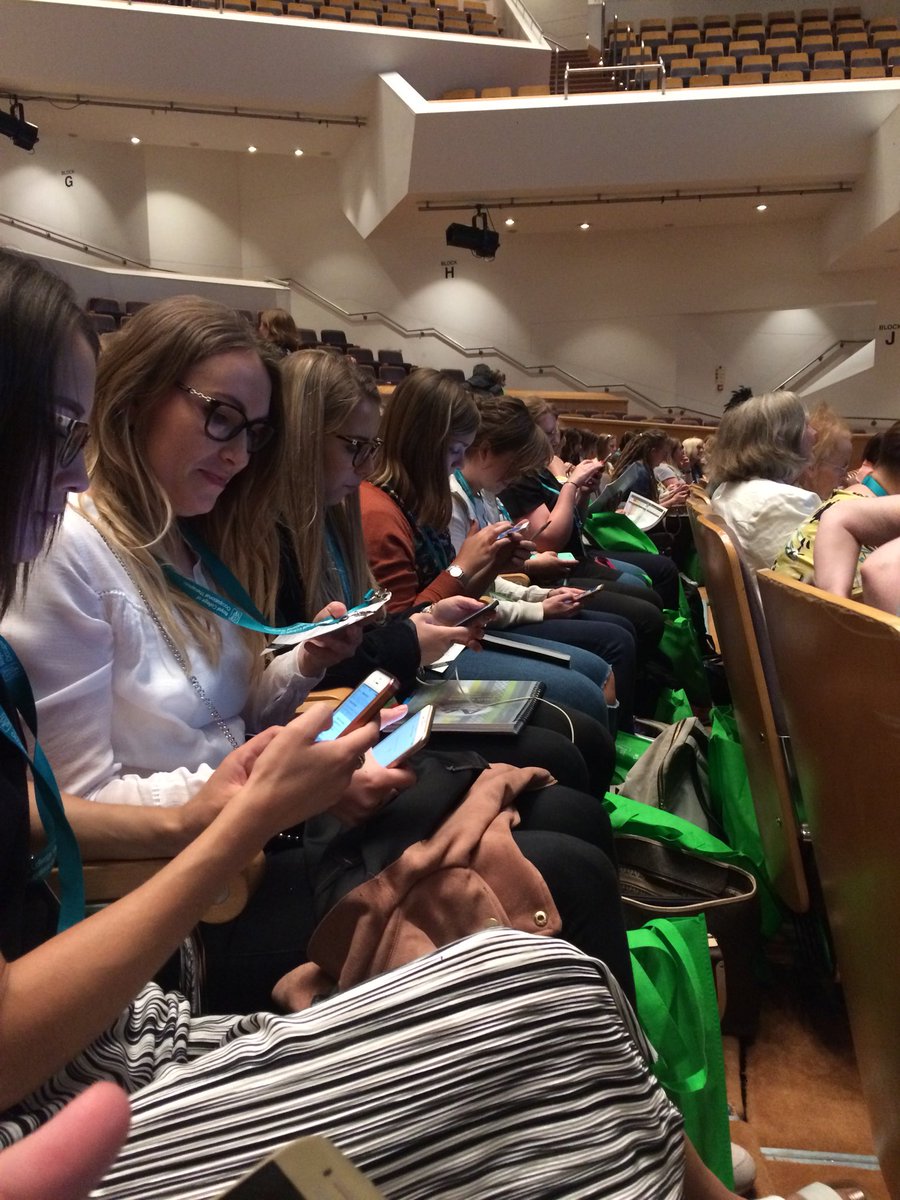 OTsocietyUoE's tweet photo. The #Essex crowd are all Tweeting from #RCOT2018, waiting for the plenary to begin @OTsocietyUoE @UoE_OT https://t.co/WHY68xKyKZ