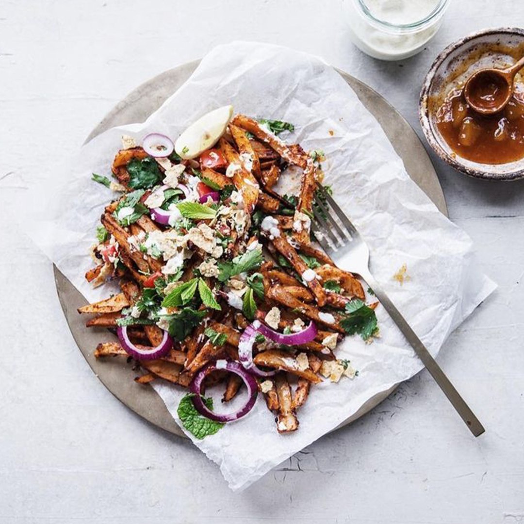 Watching the match? <a href="/cookrepublic/">Sneh Roy</a>'s loaded Tandoori fries with smashed Pappadums, cumin yoghurt and Mango Chutney is our go-to snack – just add a cold beer!