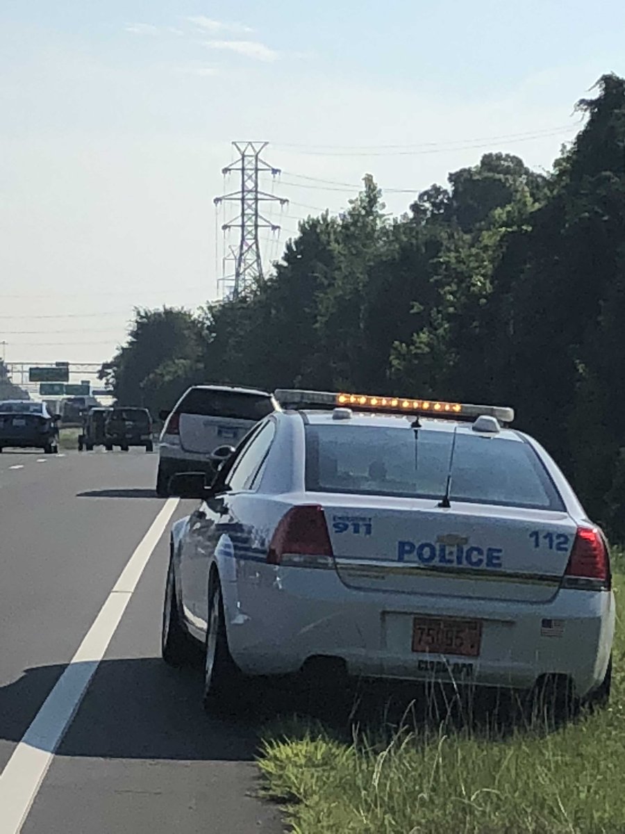 CMPD's tweet photo. [TRAFFIC OPERATION] Officers stopped 42 drivers for “interstate surfing” on I-77/Arrowwood RD during rush hour. Drivers are using the ramp to “surf” past stopped traffic on I-77, using the “turn only” lane on Arrowwood to get right back on I-77. This will be an on-going operation https://t.co/ZnXEUGKmpk