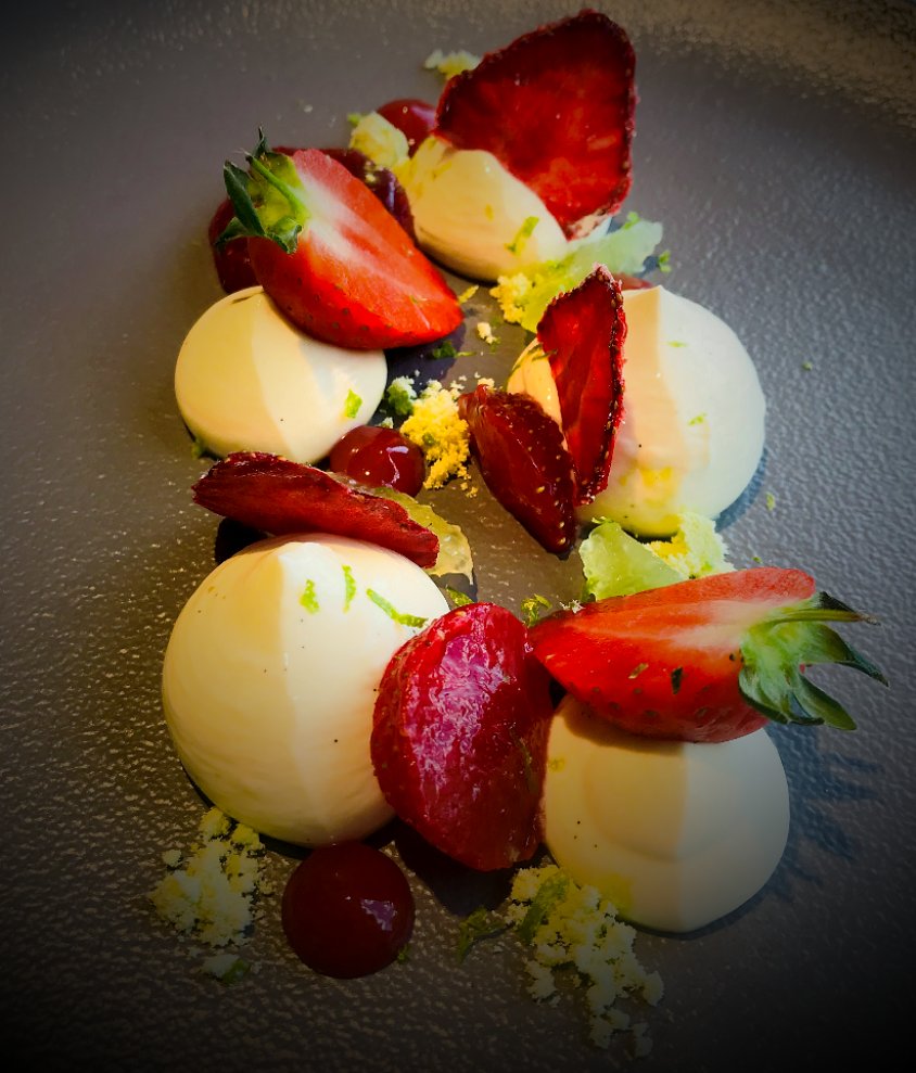 Highbullen's tweet photo. Any gin and strawberry lovers out there? Then this new dessert on our menu tonight is for you - vanilla mascarpone mousse with gin compressed strawberries, basil and lime 😊 
#DevonFoodHour #Highbullen #gin #strawberries #nearlywimbeldon https://t.co/AYllGvQieg