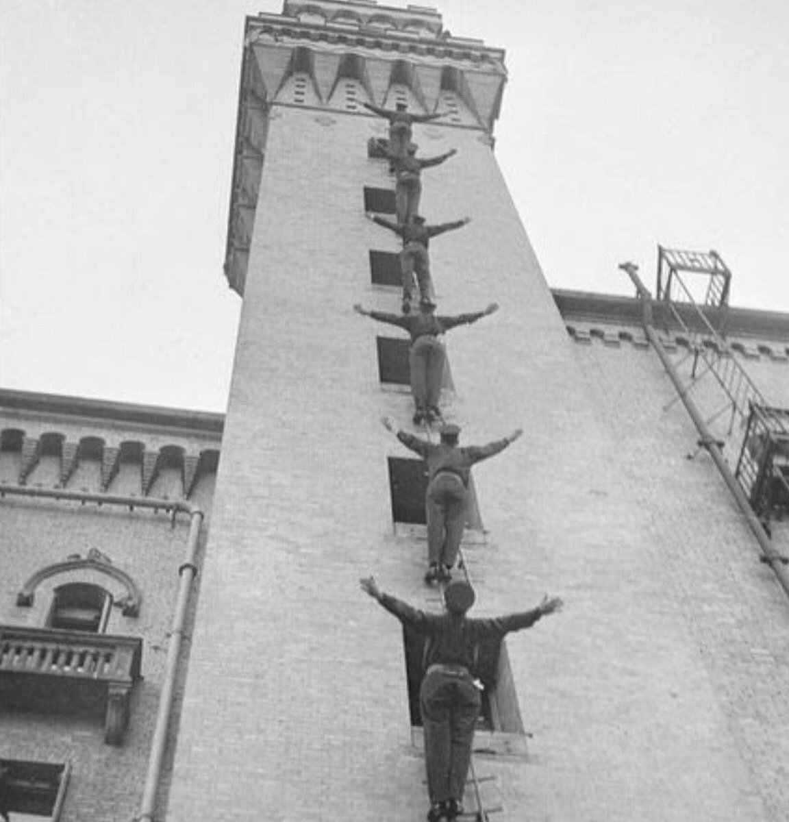 Boston FF’s demonstrating the use of pompier ladders in 1935. Although