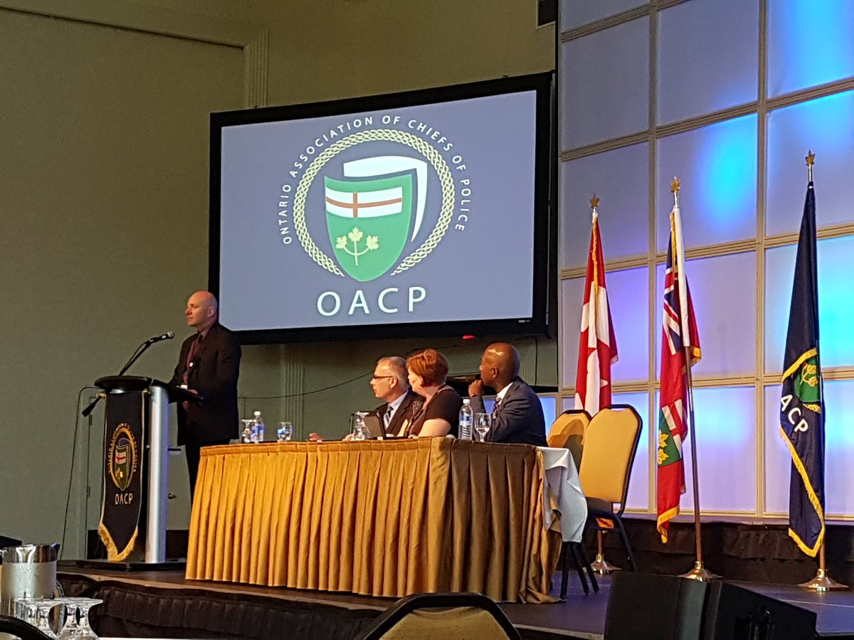 PhilCrnko's tweet photo. Superb educational panel on Community Safety & Well Being at #OACP2018. Great insights from @ChiefPaul_GSPS and @DeputyNish, Stephanie Lefebvre of the CMHA @StephLe5 in Sudbury, and @ChiefAFletcher. Community consultation & building relationships is key! #OACP18 @MotoSolutions https://t.co/Q1renjEVh0