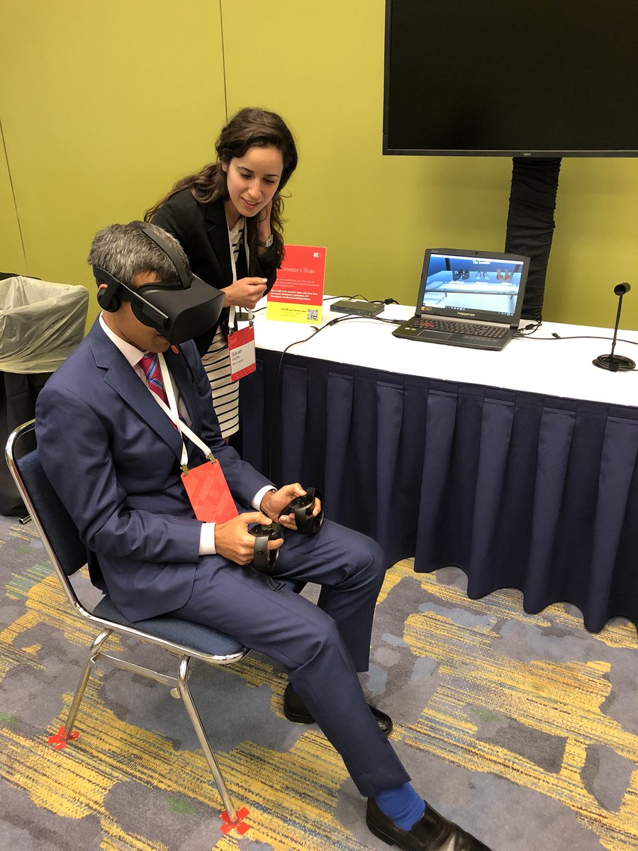 gchatter's tweet photo. Our very own @KK_Chicago testing out the #VR experience in the #MICUS press room! @snwirth https://t.co/bz2HsKL6aw