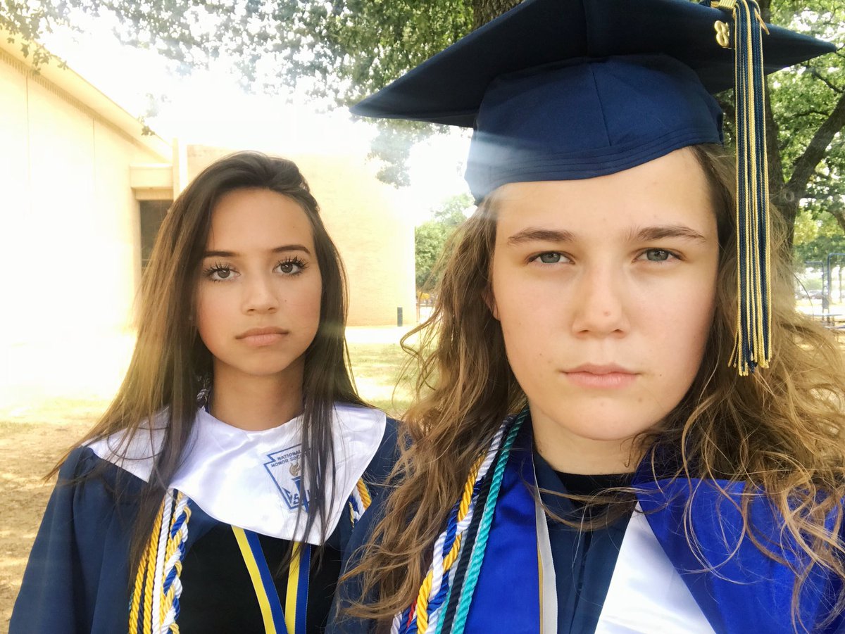 We did not drive to UTA in our gowns three weeks after graduation to recreate our picture from the first day of sophomore year