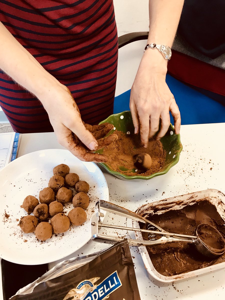hiromis's tweet photo. Early morning vegan chocolate truffle making by Jenny in the counseling office. Last full day of school #spreadlove #aisgzcounseling #AISGZ https://t.co/SRu3xmIatu