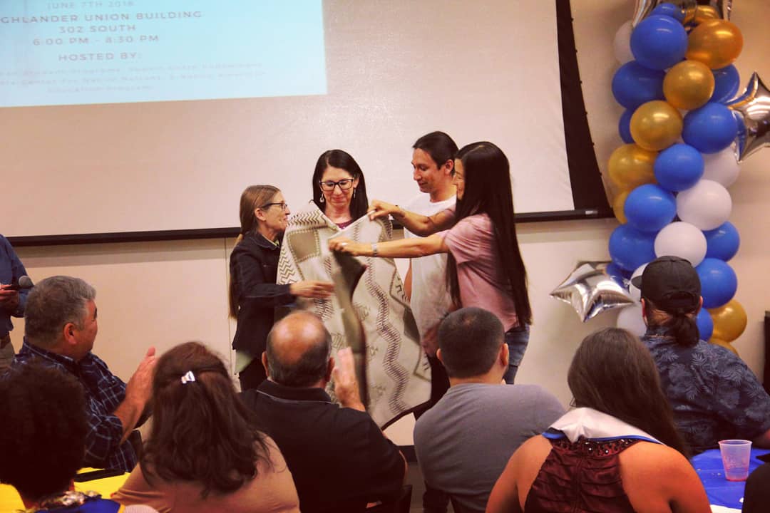 naspucr's tweet photo. Dr. Clifford Trafzer, the Costo Endowment Chair, honored #NativeFaculty Michelle Raheja, and #NASPUCR director Josh Gonzales with #pendletonblankets at the #NativeGrad banquet for their work with the #Native community. We are greatful to have them! https://t.co/SxxJTRXYnj