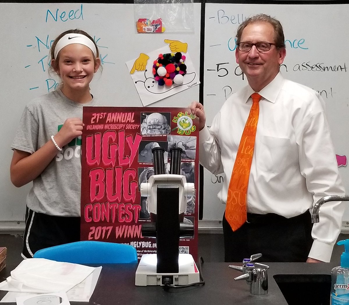 BMeekAnatomy's tweet photo. Winner in @OklaUglyBug contest is Jessica King's 6th Grade Class in Wagoner, OK.  Delivery of Stereomicroscope to the class, Student Lanie Brown captured the rhinocerous beetle. #newmicroscopists https://t.co/ae8rG9g0q7