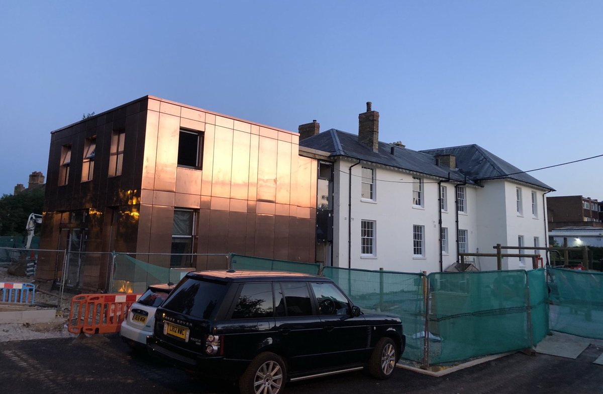 SFSOxford's tweet photo. Today the scaffolding came down to reveal our shiny new Pre-Prep extension! #coppercladding #architecture #preprep #independenteducation https://t.co/3g37CKJN86