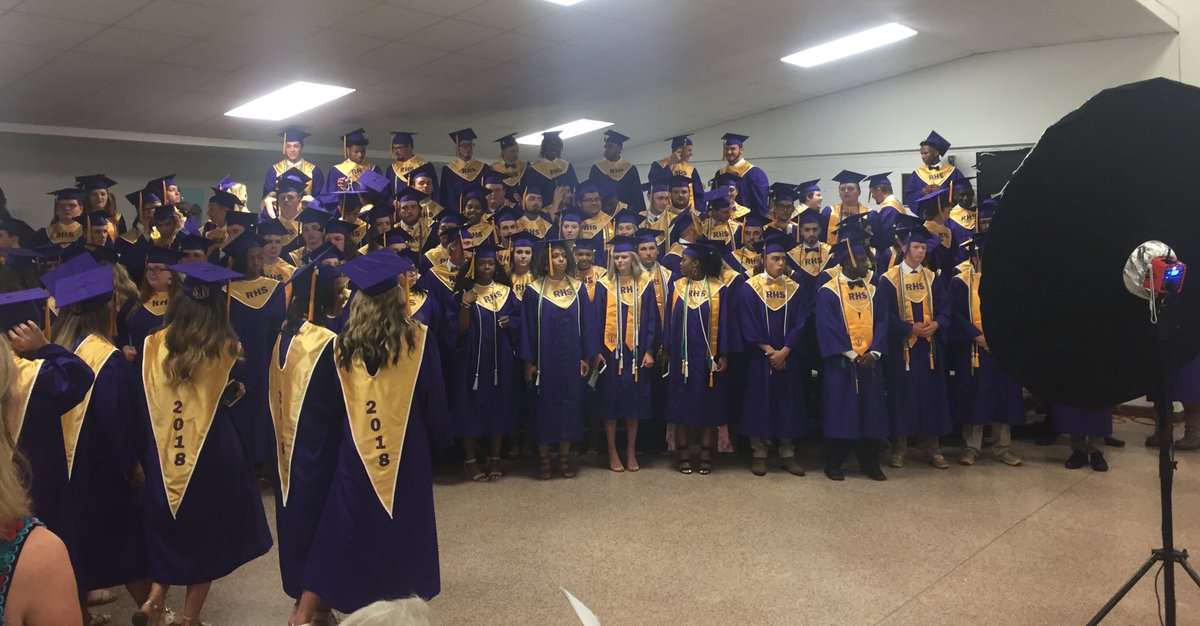 Trying to fit in the frame for the senior picture. #somanygraduates #classof2018 #graduation