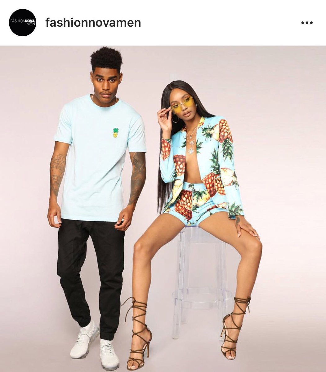 I think they misunderstood what we wanted... 

We wanted the men's version of what she has on. Big bold pattern. Showing skin. 2 piece matching set. Is that silk? Meanwhile, homeboy is rocking a t-shirt with a pineapple on it.