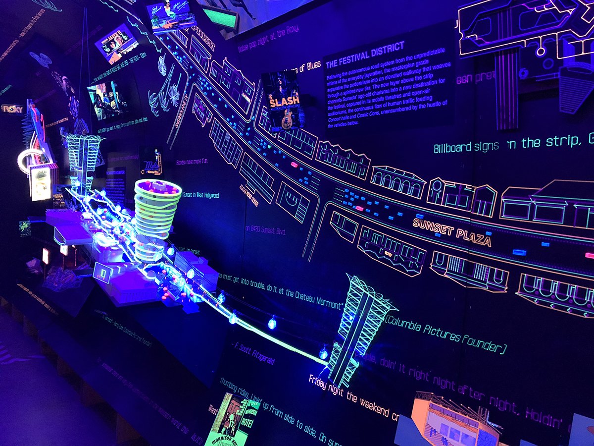 UCLA_AUD's tweet photo. RUMBLE @hodgettssuprastudio Sunset Strip 2050 Craig Hodgetts w Marta Nowak focusing on iconic Sunset Strip spanning the length of music’s mecca entails a billboard culture that made the dreams of many an aspiring rock star. @uclaarts #sunsetstrip #architecture #exhibition https://t.co/dGUjRP1wiF