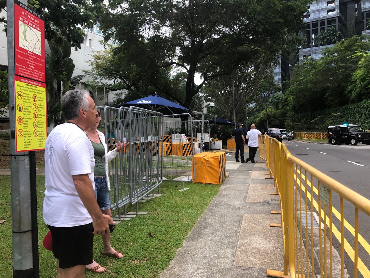 janeapeterson's tweet photo. Waiting for trump motorcade next to Shangri La Hotel... no onlookers one here. Everyone at St Regis waiting for Kim! https://t.co/52kF262do7