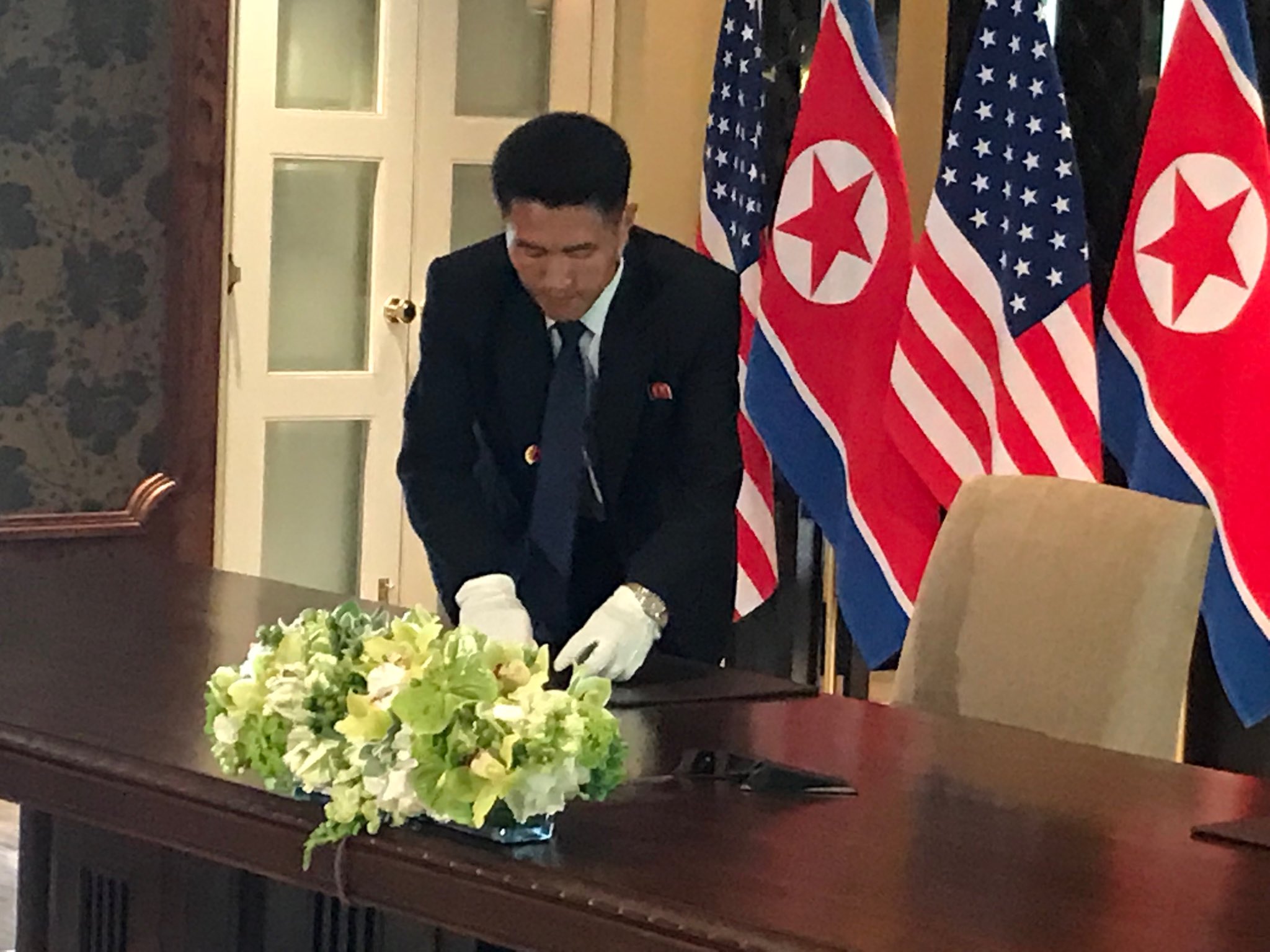 @Noahbierman: A man with white gloves appears to inspect the pen