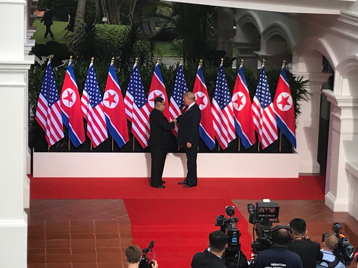 latimes's tweet photo. Trump just became the first U.S. president to meet a North Korean head of state https://t.co/ykKj4SZifF https://t.co/dQN7eAsIbR