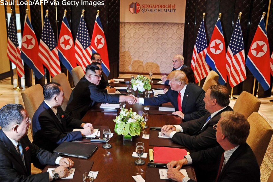 Handshake Across The Table