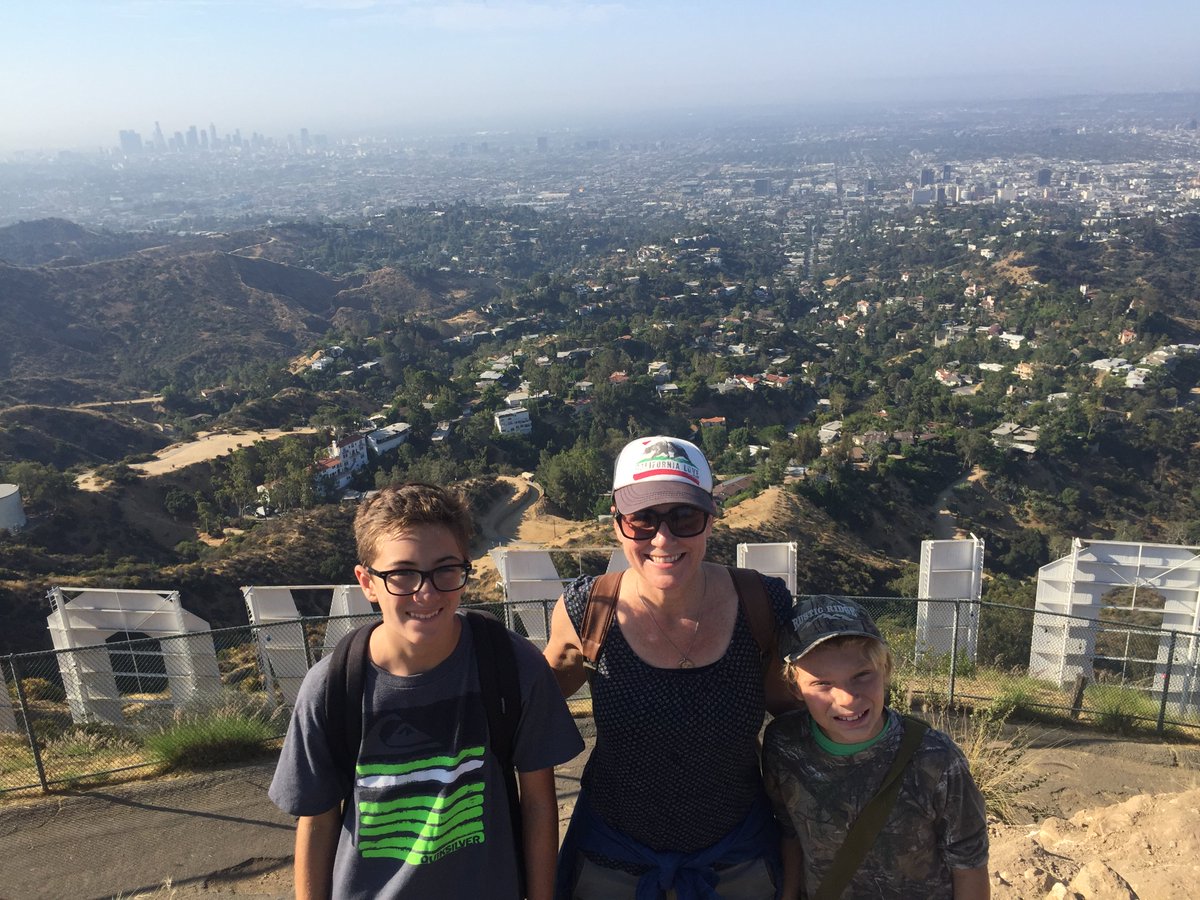 LibraryGirl47's tweet image. Born and raised a SoCal girl!  
Hello everyone! My name is Deanna and my hometown is Fullerton, California! I love that I am 30 minutes from the beach or an hour from the local mountains. Here are me and my boys hiking to the Hollywood sign last summer.  #info246w2