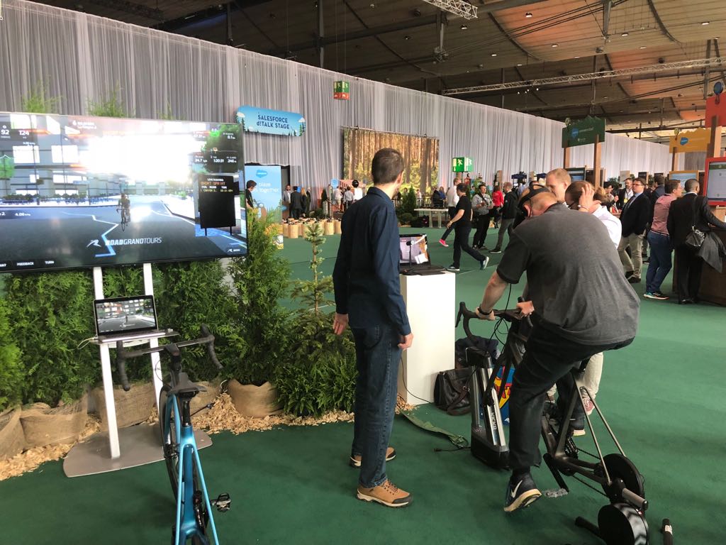 RoadGrandTours's tweet photo. RGT VR at #CEBIT18 with our friends from @canyon_bikes and @wahoofitness, all happening in Hall 9 with @salesforce #trailblazer . Cool bikes, Kickr Climb and RGT in VR, what's not to like! Drop by and say hi! https://t.co/SRu11fusGB