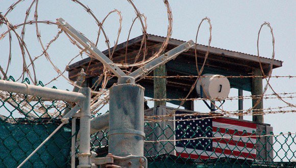 Guantanamo Naval Base, a violation of international law.