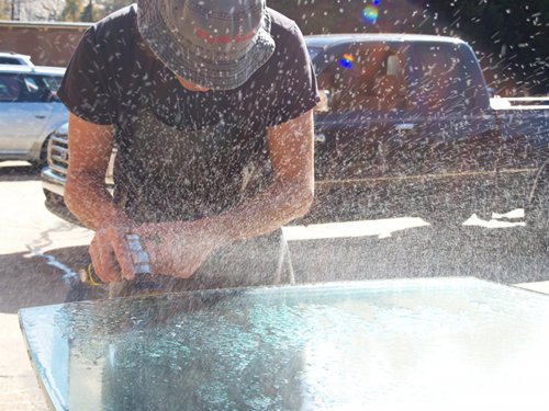 At Stoneline, the devil is in the details. Brian finishes the glass edge of a boat shaped conference table with an angle grinder. bit.ly/2l2CGmi

#glassconferencetable #processpic #custom #stonelinedesigns