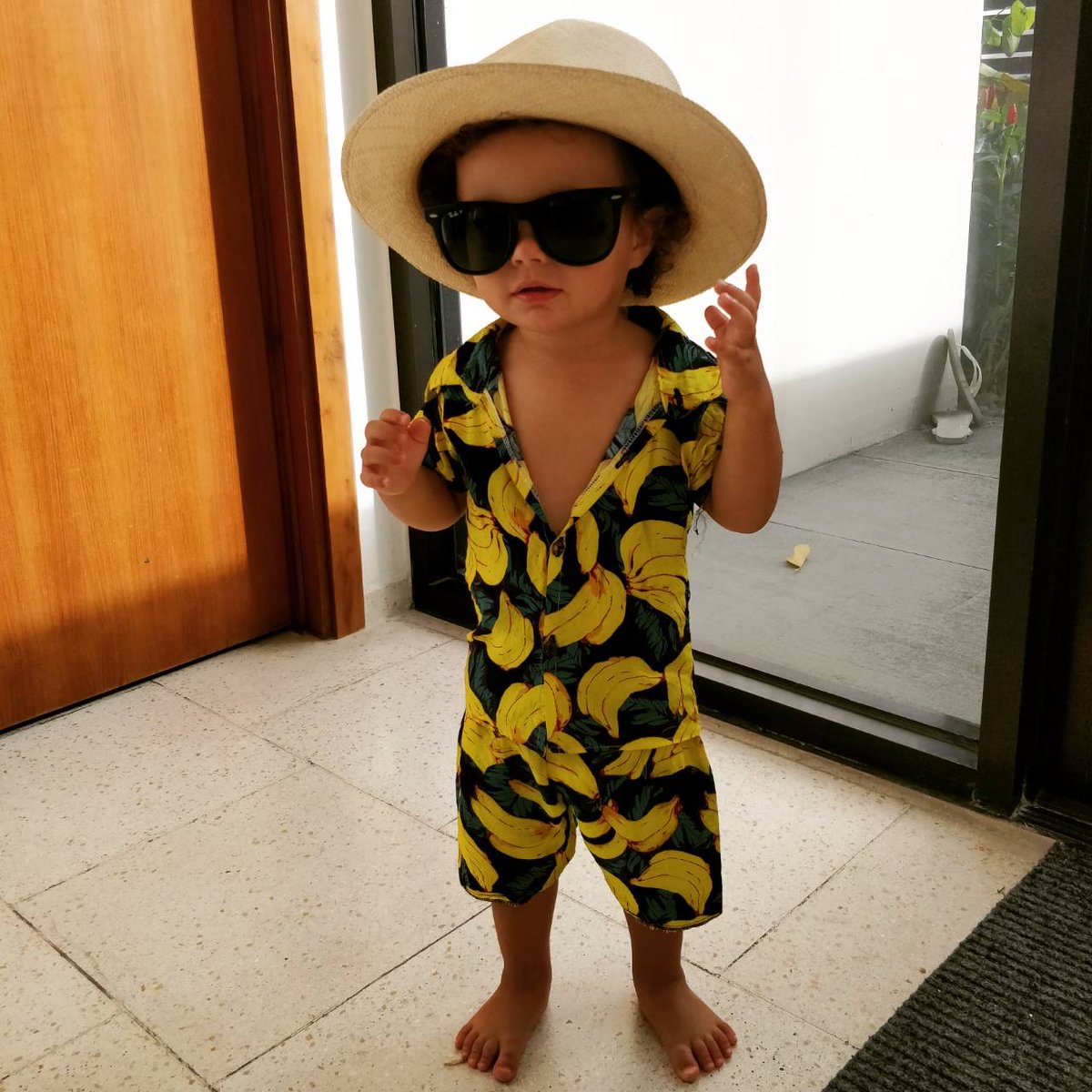 24 carat Lebo in the air. Little man rocking his <a href="/BrunoMars/">Bruno Mars</a> tribute on hols in #Vietnam #bananasinpyjamas