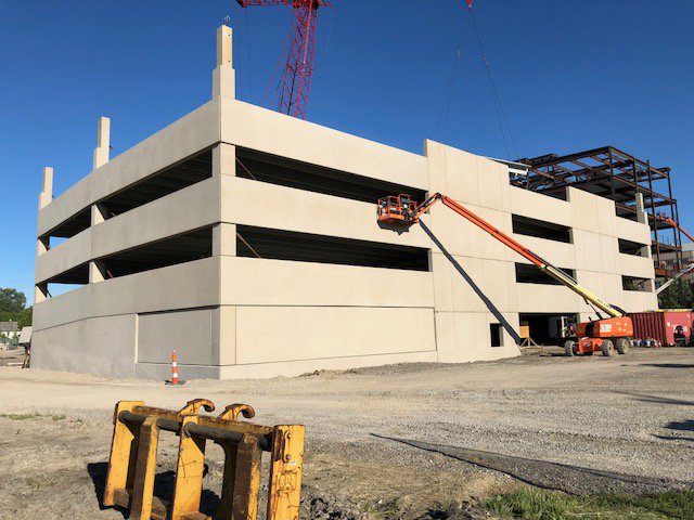 PrestressGroup's tweet photo. HFCC Deck is across street from Henry Ford Hospital in downtown Detroit.
630 pieces precast concrete units such as beams, columns ,spandrels &amp; double tees w/ a total sq. ft. of the double tees approx. 191,000.00 sq. ft. The exterior finish is acid etch and looks like limestone. https://t.co/MIgP1DNY6x