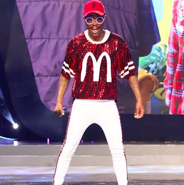 safashionweek's tweet photo. #Spotted: @somizi , SOMGAGA, during the #SAMAS24 dress rehearsals in a@gertjohan #BigMac50 glossy!!! Have you shopped your one-of-a-kind piece yet? Join the fashion train! π @McDonalds #SAFW #CelebStyle #Zalebs https://t.co/kzQGlsfpgr