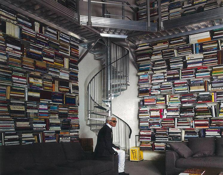 Fashion icon Karl Lagerfeld stores his books horizontally. His personal library reportedly houses over 230,000 books... mostly art books. Apparently when Karl reads a paperback, he rips out the pages as he goes. “I’m mad for books… It is a disease I won’t recover from,” he says.