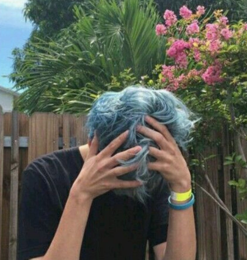 "Sometimes all you gotta do is mess up your hair and strike a pose~"