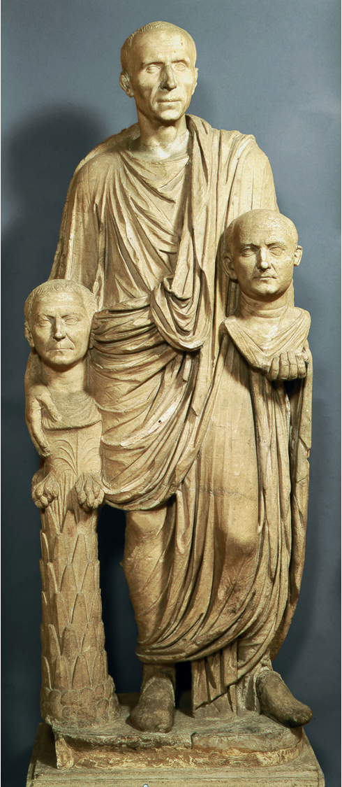 A statue of a Roman holding the busts of his ancestors, the so