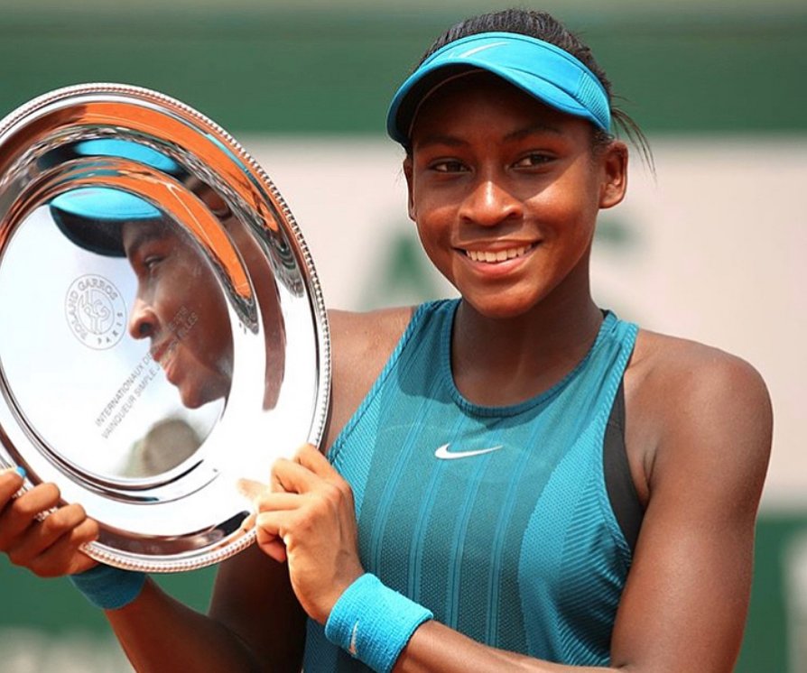 Essence's tweet image. Tennis star Cori “Coco” Gauff just made history as the youngest woman to win a junior title at the French Open in 24 years. ow.ly/dYsX50hFx6E