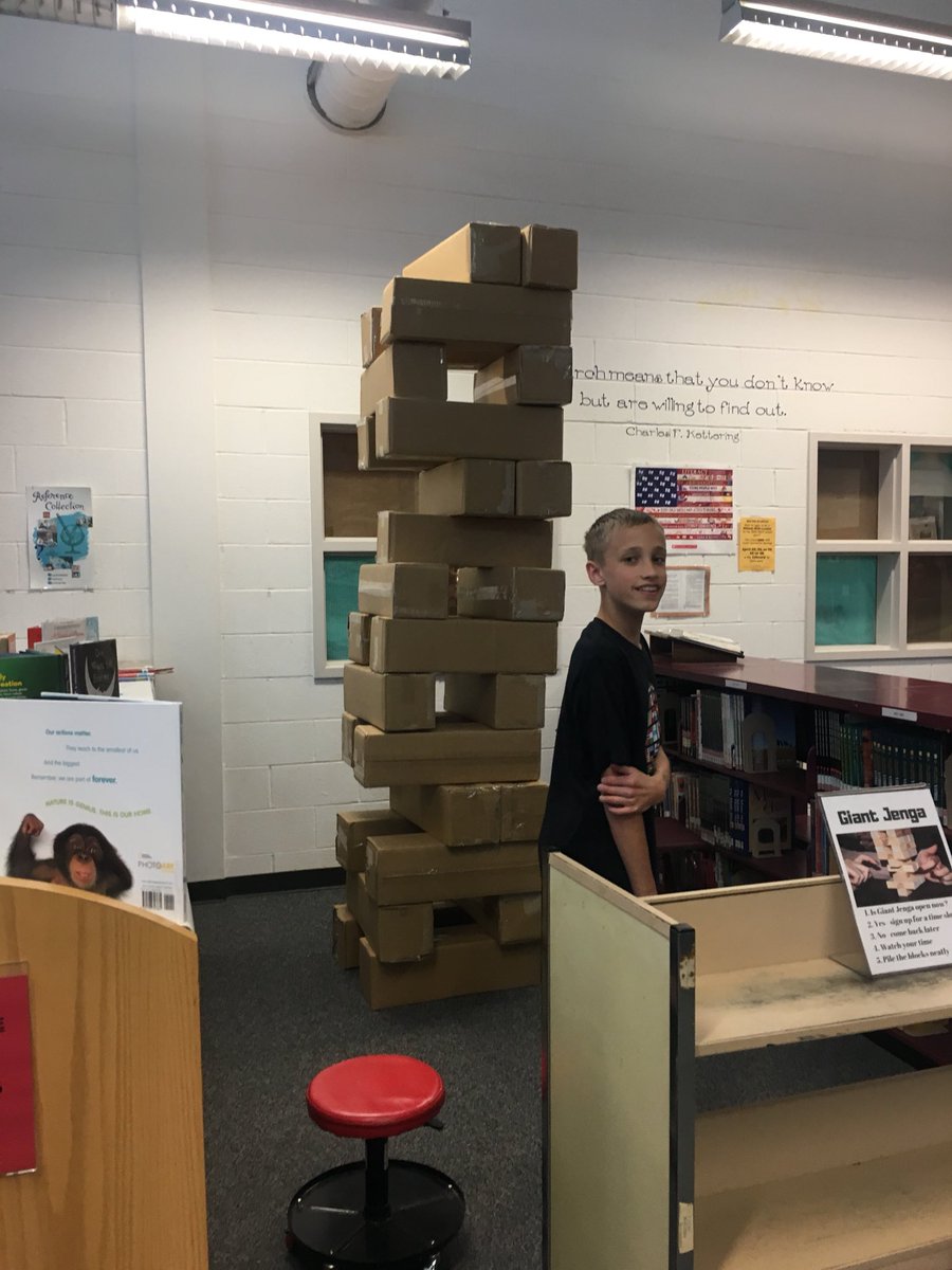 Giant Jenga is happening people. #everybodyplays #stretch #reuse #examstressrelief #librarylife #librarygames