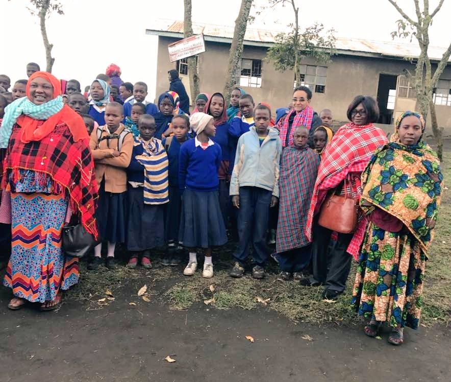 FCSTZ's tweet photo. Students of Engalaoni Primary School who are among beneficiaries of Centre for Women, Children and Youth Development together with #SwissDevelopmentCooperation and @FCSTZ staff and Board Member Mr. Fredrick Msigallah https://t.co/PmkJ5lrdhP
