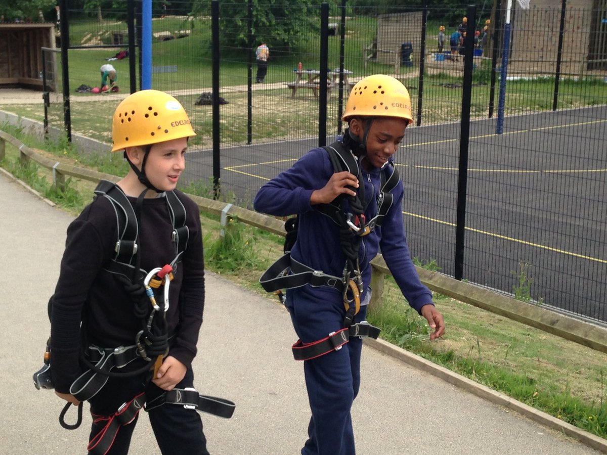 TSMBalham's tweet photo. Day 2 at PGL. We have had a go at the trampolines, faced our fear of heights at the climbing wall, aimed for the bulls eye at rifle shooting and flew along the zip wire!!! #TSMFamily #facedfears #pgl https://t.co/w15bTUXd8X
