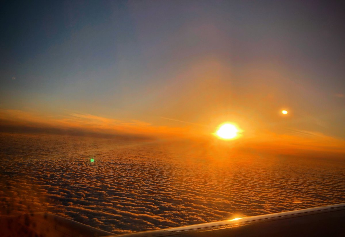 fintanmurphy's tweet photo. It might be cloudy in Dublin but above the clouds it’s beautiful. Home after a week of travel! #hiddensunset #sunset #dublin #dublinairport #home https://t.co/kXxEo6sdYr