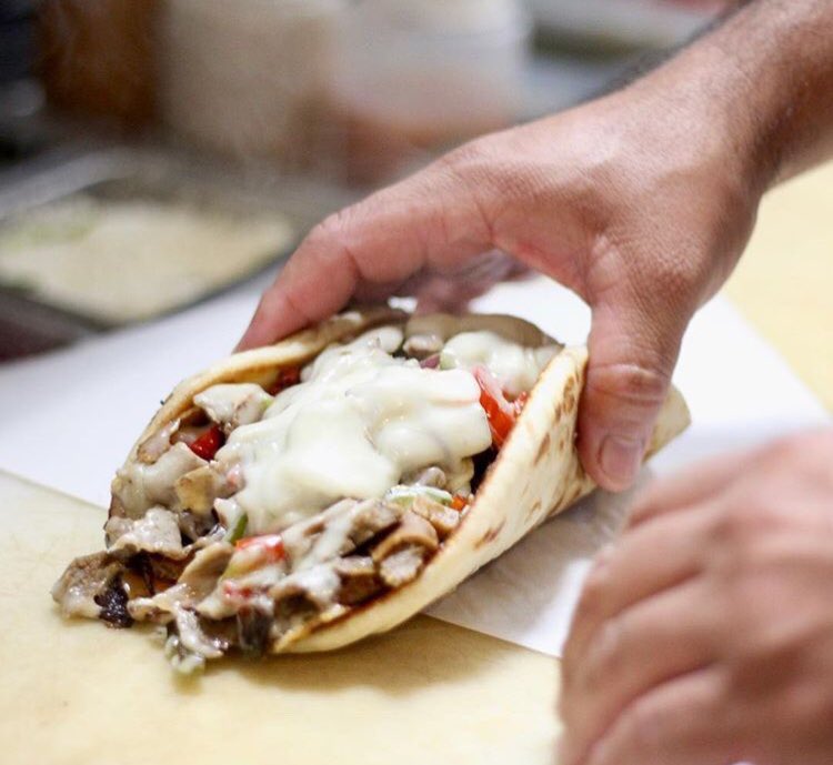 Bring on the cheese🧀 Come in today and try out our Greek Philly Wrap! Hand wrapped to perfection, each and every time ✔️ 
📷: @libertypublicmarket
