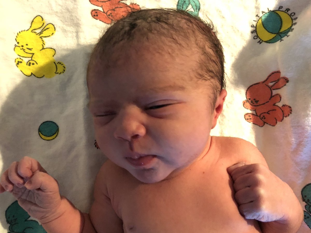 Pretty much one of the most beautiful babies ever lies on a blanket. I bet she can’t wait to meet her older sister.