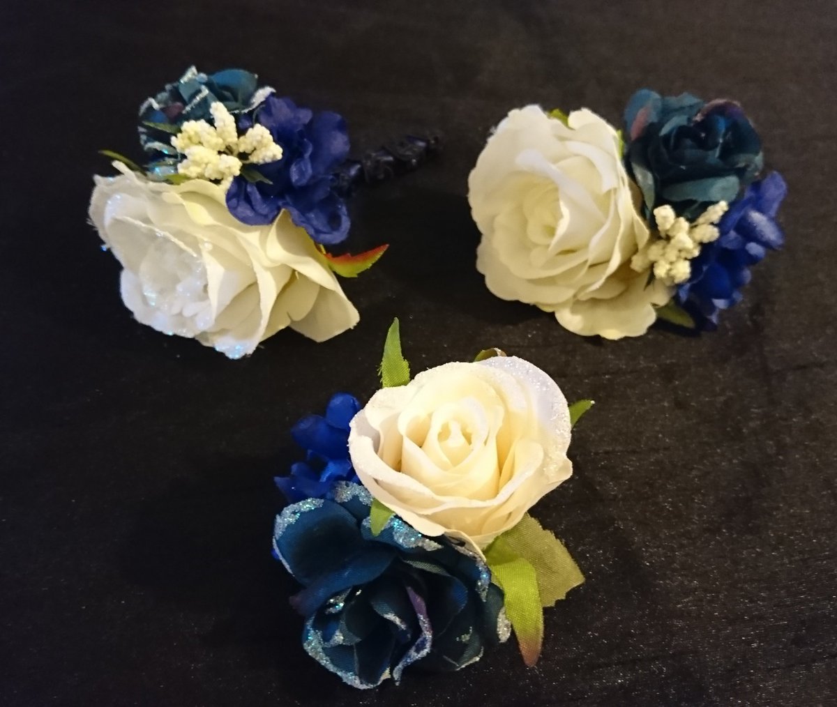 His and hers custom made coordinating buttonholes and a matching hairclip for the lady! PM me if you'd like something made for your special event. #wedding #weddingguest #buttonhole #vintage #shabbychic #rockabilly #custommade #supportsmallbusiness #hairflowers #pinup