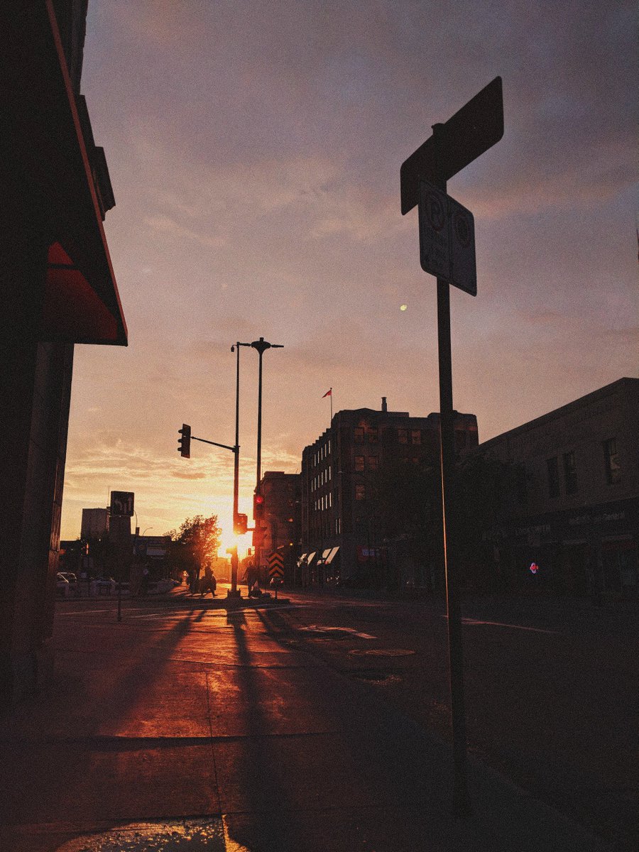 enjoycreativeca's tweet photo. Loving the long shadows while looking down Notre Dame Ave the other evening. We love finding these views around the city. Tag along and share your own shots on Instagram using #enjoywinnipeg https://t.co/hFq1x7fScb