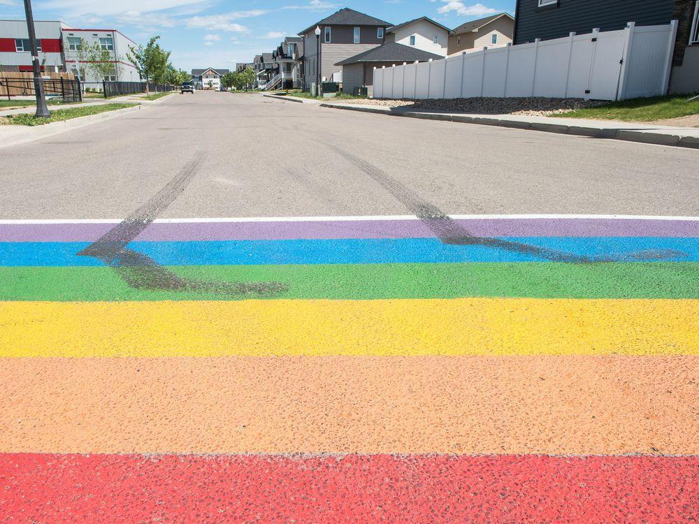 leaderpost's tweet photo. Rainbow crosswalk vandalized less than a day after being painted by students https://t.co/4W9mWlECyw https://t.co/9ZII6Qfeqd