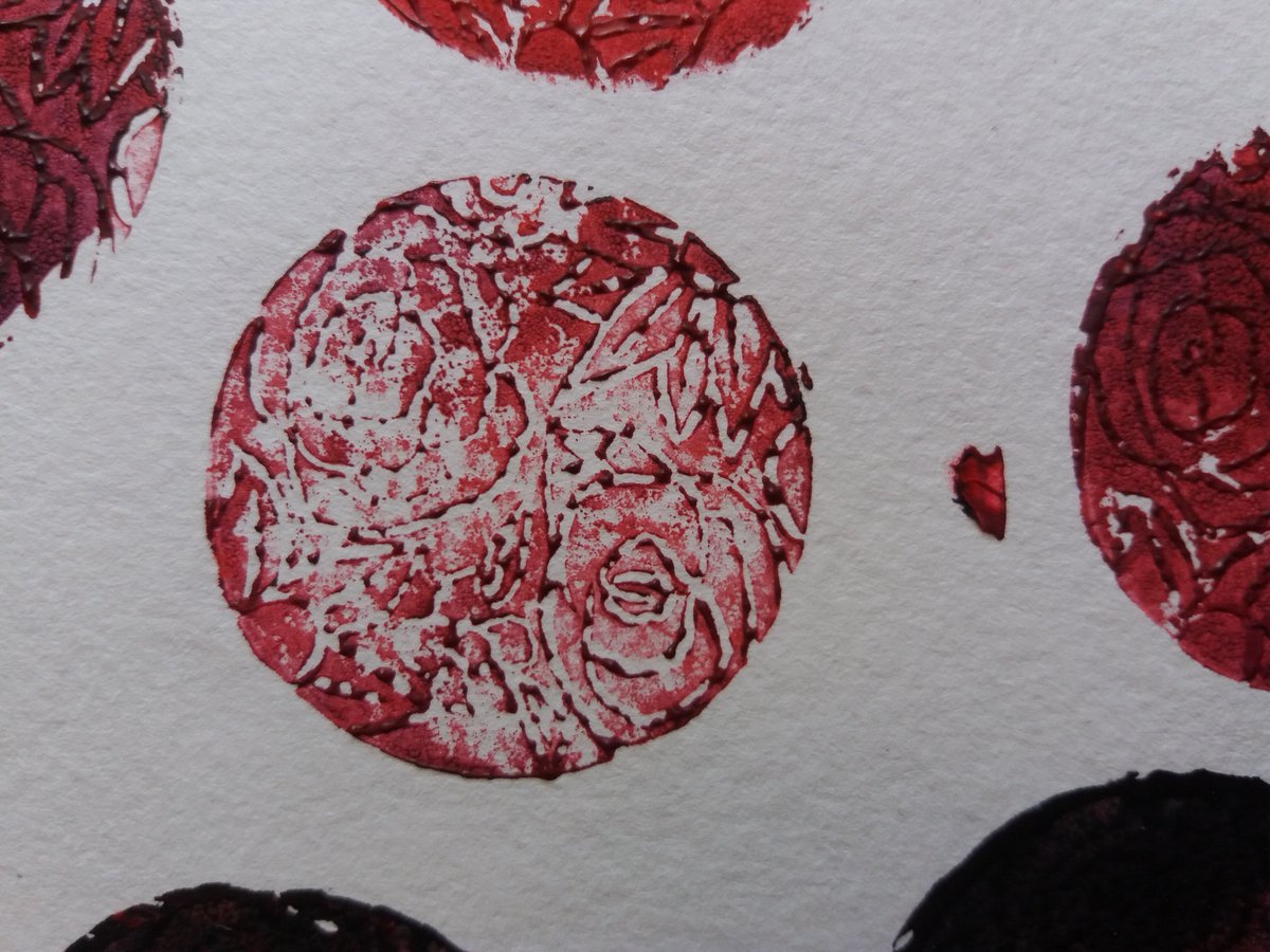 Trying different printed designs for business card logos.