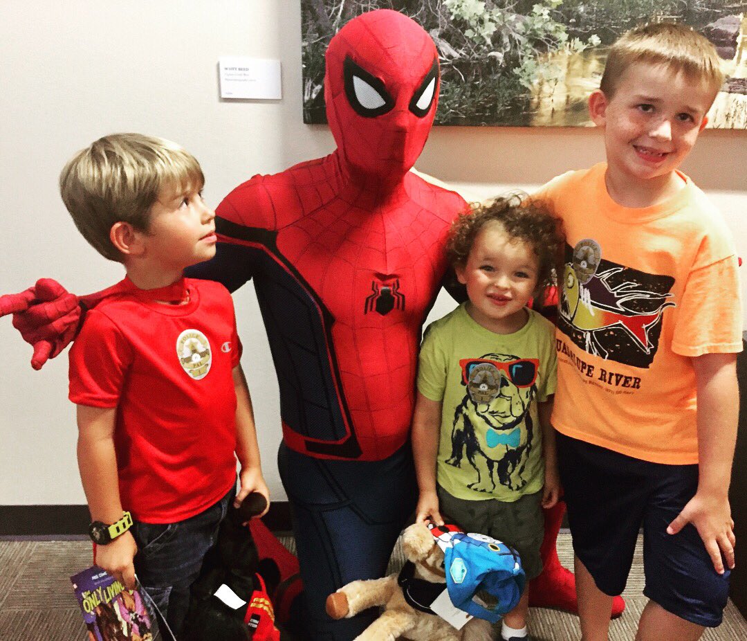 Austin_Police's tweet photo. APD hosted our fourth annual Super Hero Day at Dell Children's Hospital earlier today! It's an honor to bring smiles to these brave children who are the real superheroes - fighting to get better every day. #AustinPD #SuperHeroDay https://t.co/Gx0Z0gWi0e