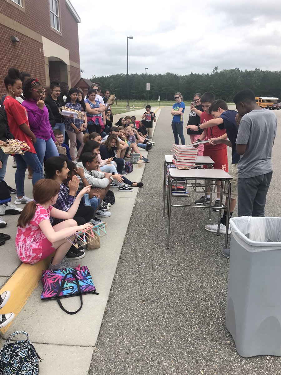 A great finish to our PBL project!  Bridge testing today for math class.  @EDMS_Principal #EDMSRavens