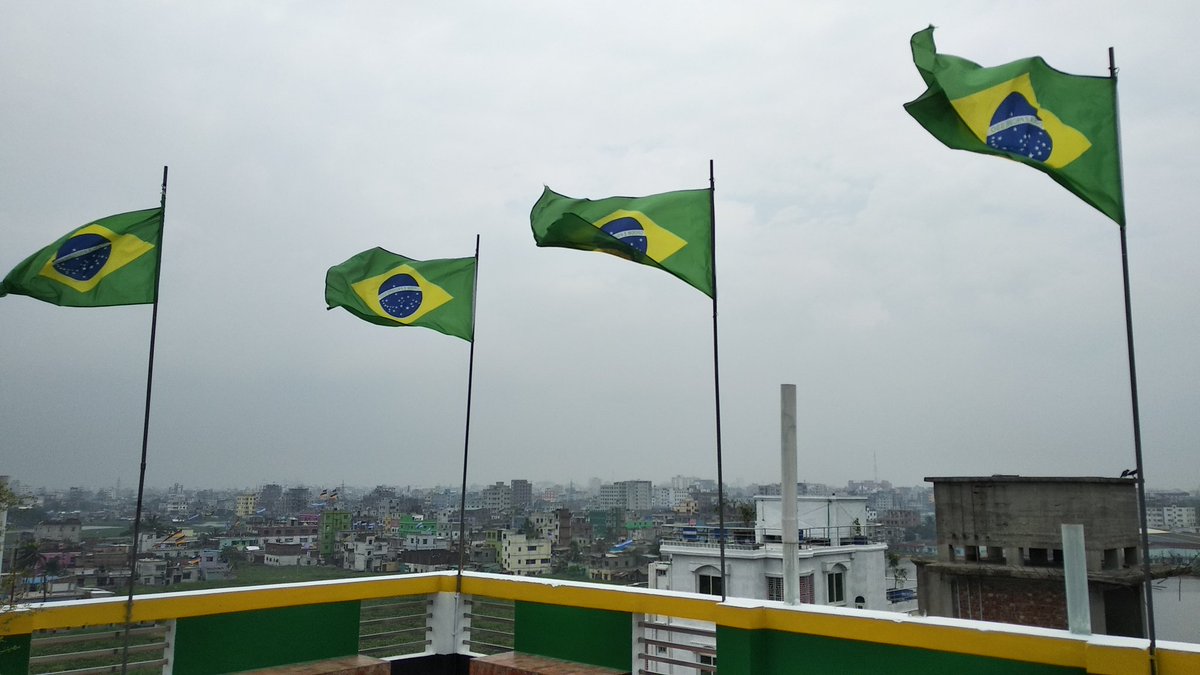 saadhammadi's tweet photo. Flags waving at the #BrazilHouse in Narayanganj, a day before the #FifaWorldCup2018 #Russia2018. Football madness connects people of all age and income groups in #Bangladesh every time during #WorldCup . https://t.co/5jlfc5eUKb